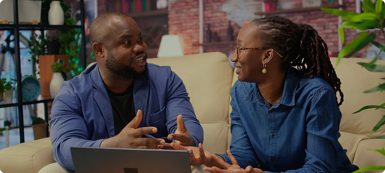 Clients reviewing their portfolio together at home
